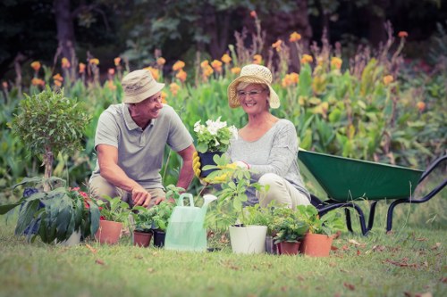 Front view of a gardener inspecting a garden bed